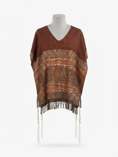 Piece 13: tzitzit tied into a copper paisley cloth with a woven border, on a mannequin